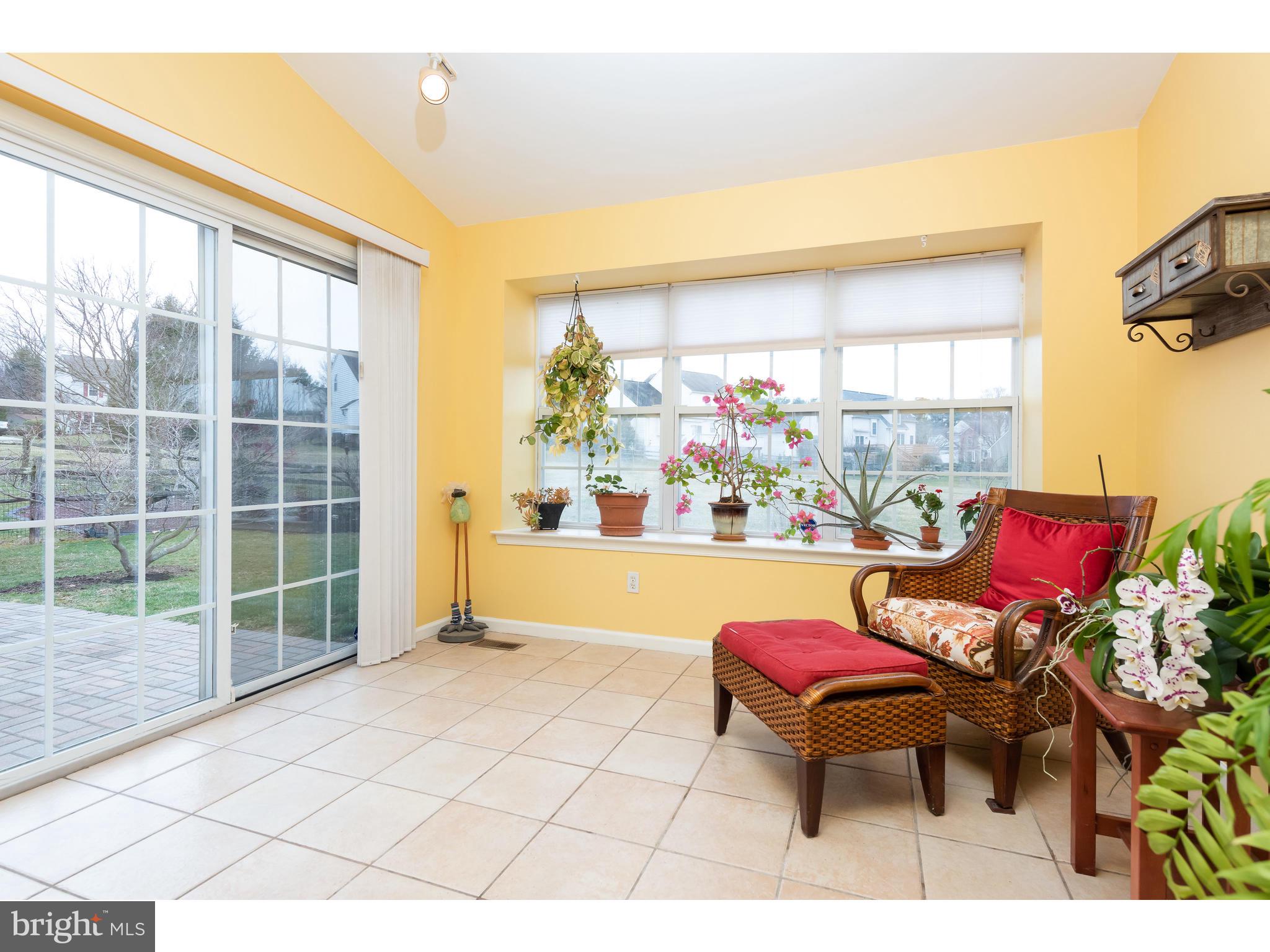 14 North Hawthorne Road Coatesville, PA 19320 - Photo 15 of 27 Sun room opens to patio