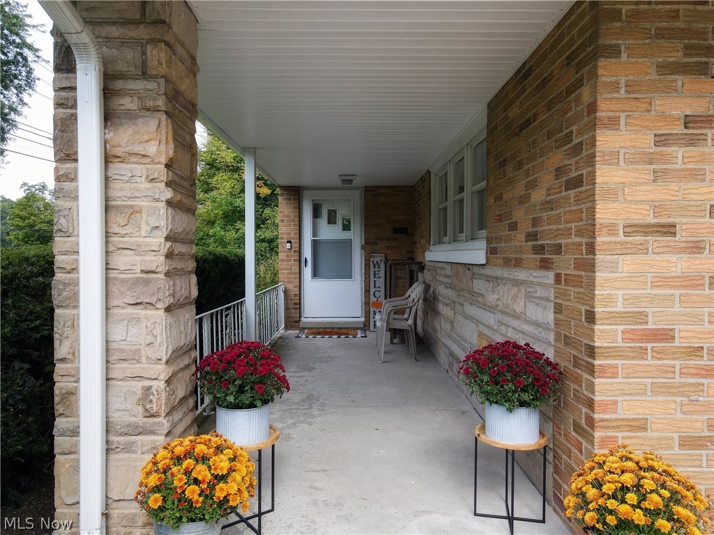 11479 Valley View Road Northfield, OH 44067 - Photo 2 of 35 Covered porch leading to front door