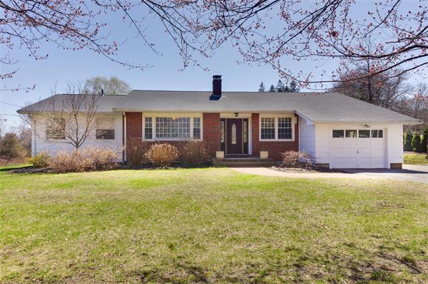 412 George Hill Road Lancaster, MA 01523 - Photo 1 of 26 front view of a house with a big yard