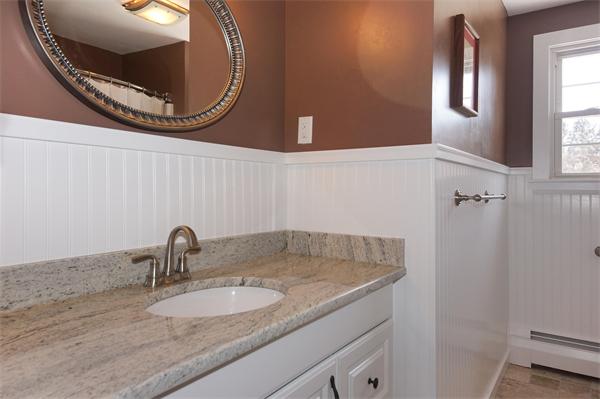 412 George Hill Road Lancaster, MA 01523 - Photo 17 of 26 a bathroom with a sink and mirror