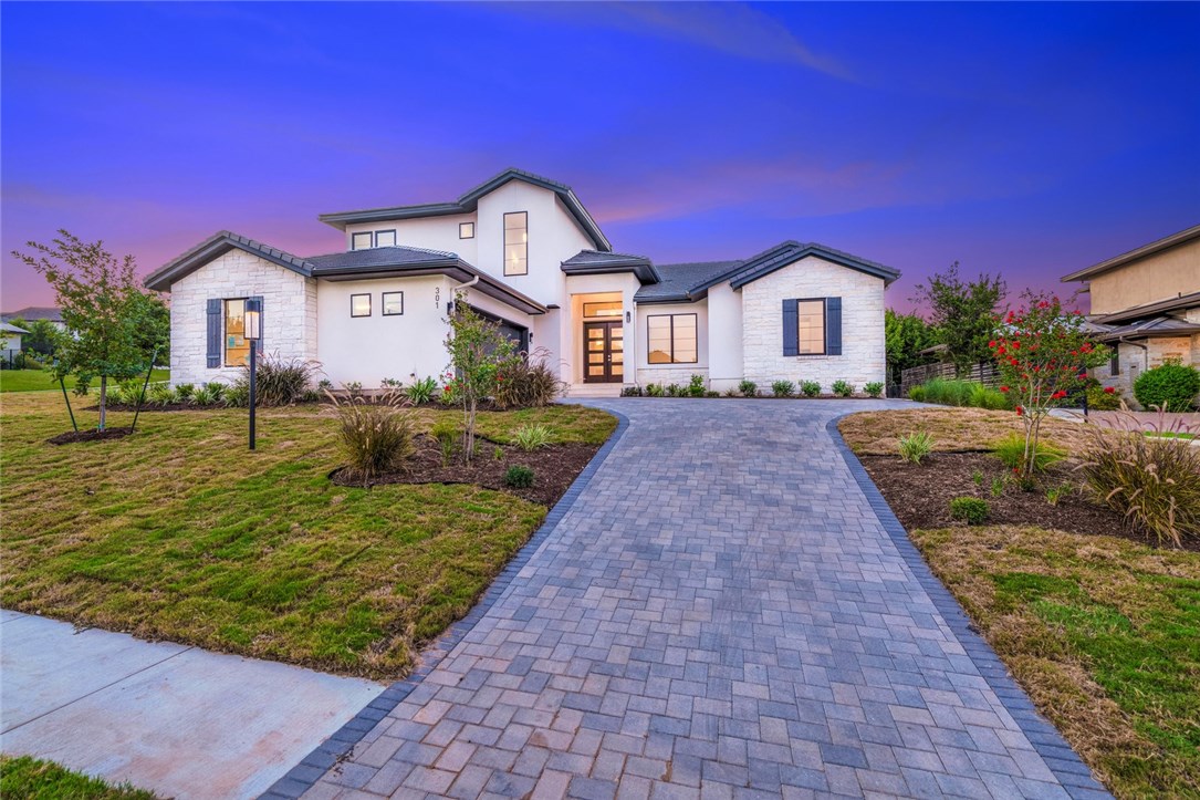 301 Black Wolf Run Austin, TX 78738 - Photo 1 of 1 a front view of a house with a yard