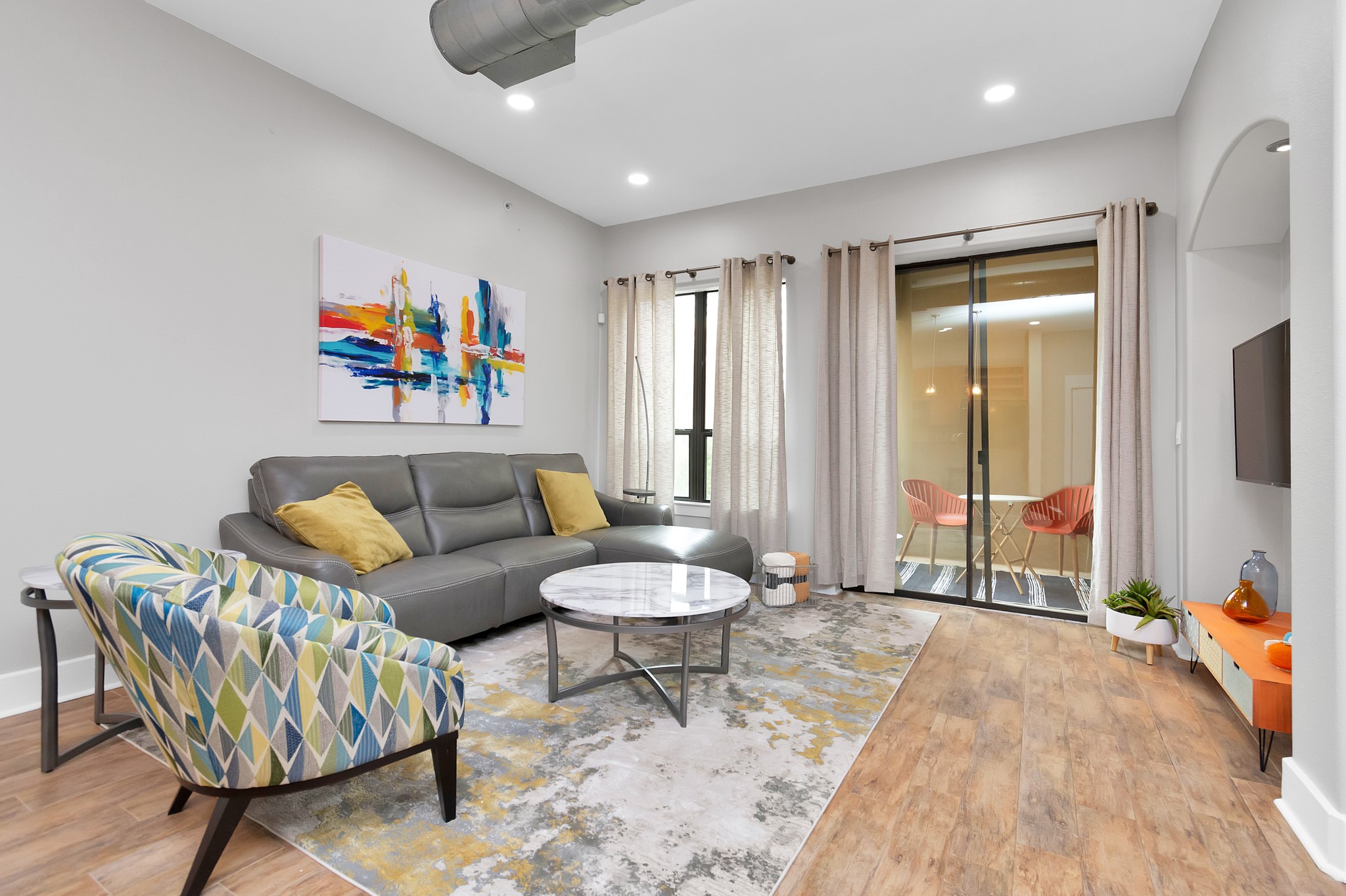 While the dining area has its own space, it is not separated from the kitchen or the living room – allowing the ambiance and conversation to flow seamlessly to each area in the home.