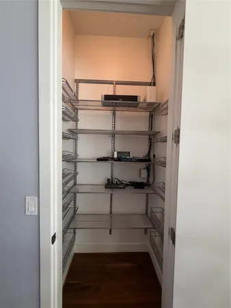 a view of a room with racks on the wall