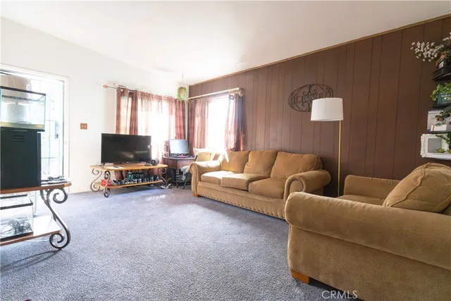 a room with a bed and a mirror