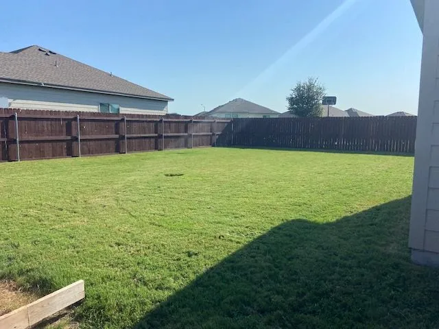 a view of an outdoor space and a yard