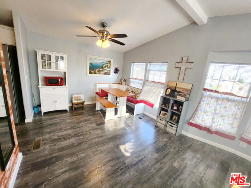 1051 Site Drive, Unit 209 Brea, CA 92821 - Photo 7 of 18 a living room with furniture and a window