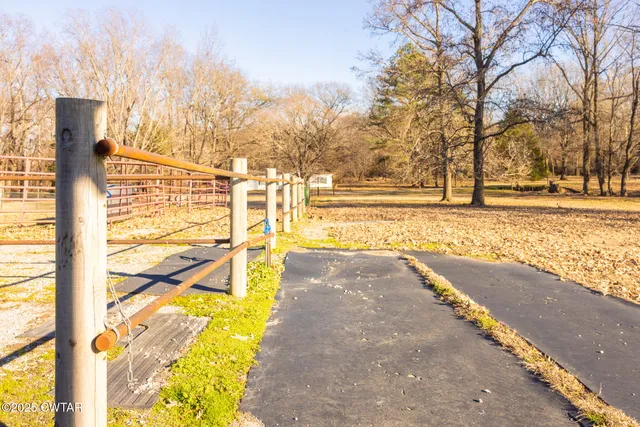 a view of a room with wooden walls