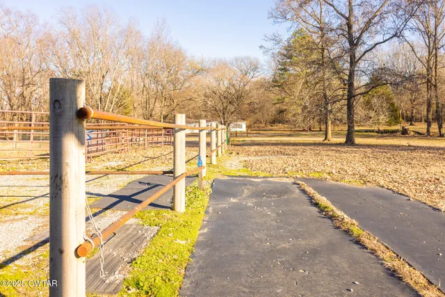 a view of a room with wooden walls