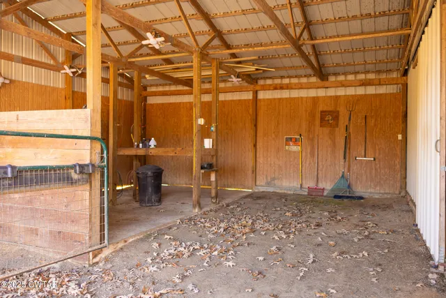 a view of a yard with trees