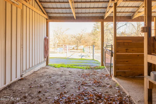 a view of a yard with trees