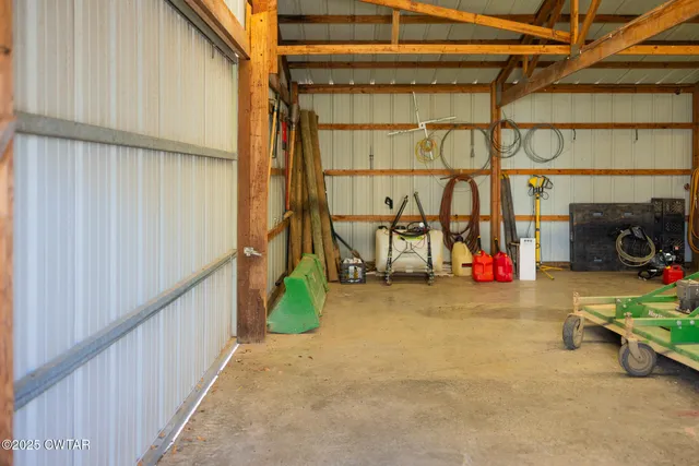 a view of road with large trees