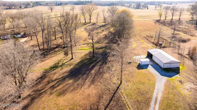 a view of outdoor space with wooden fence