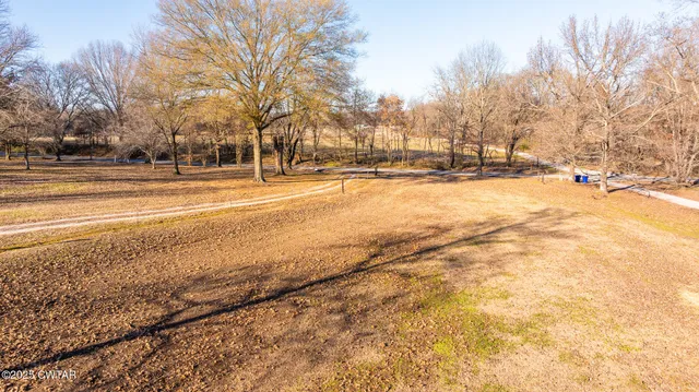 a view of swimming pool with sitting area