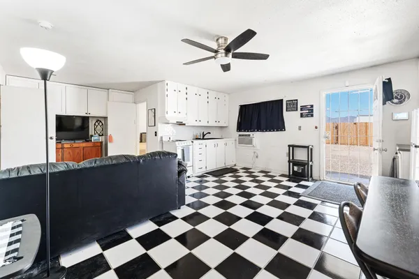 a bedroom with a bed and a table