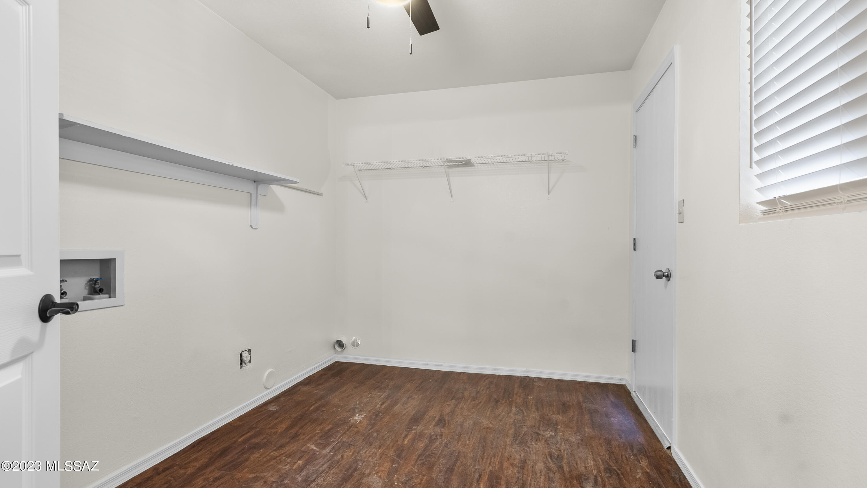 434 Paseo Bocado Rio Rico, AZ 85648 - Photo 9 of 31 a view of a room with wooden floor