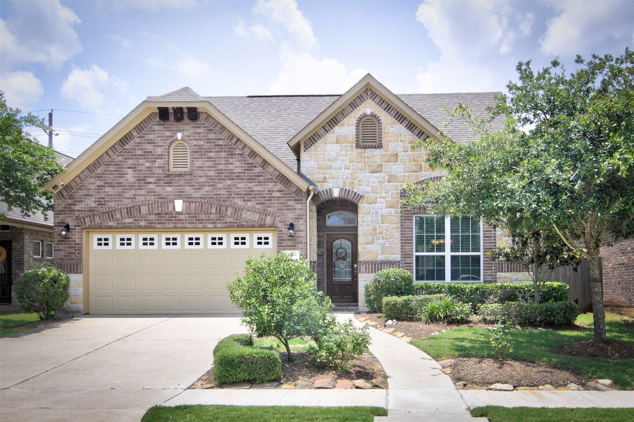 (all photos from before tenant occupied, all info per landlord) lovely home with brick-stone exterior and front landscaping maintained by HOA (less work for you!)