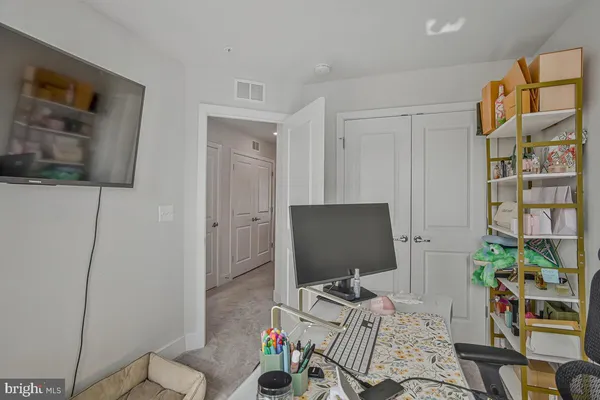a view of a balcony with furniture