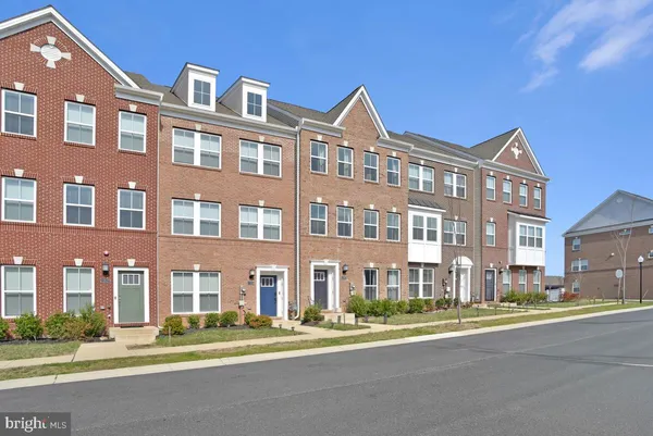 a front view of a building with street view