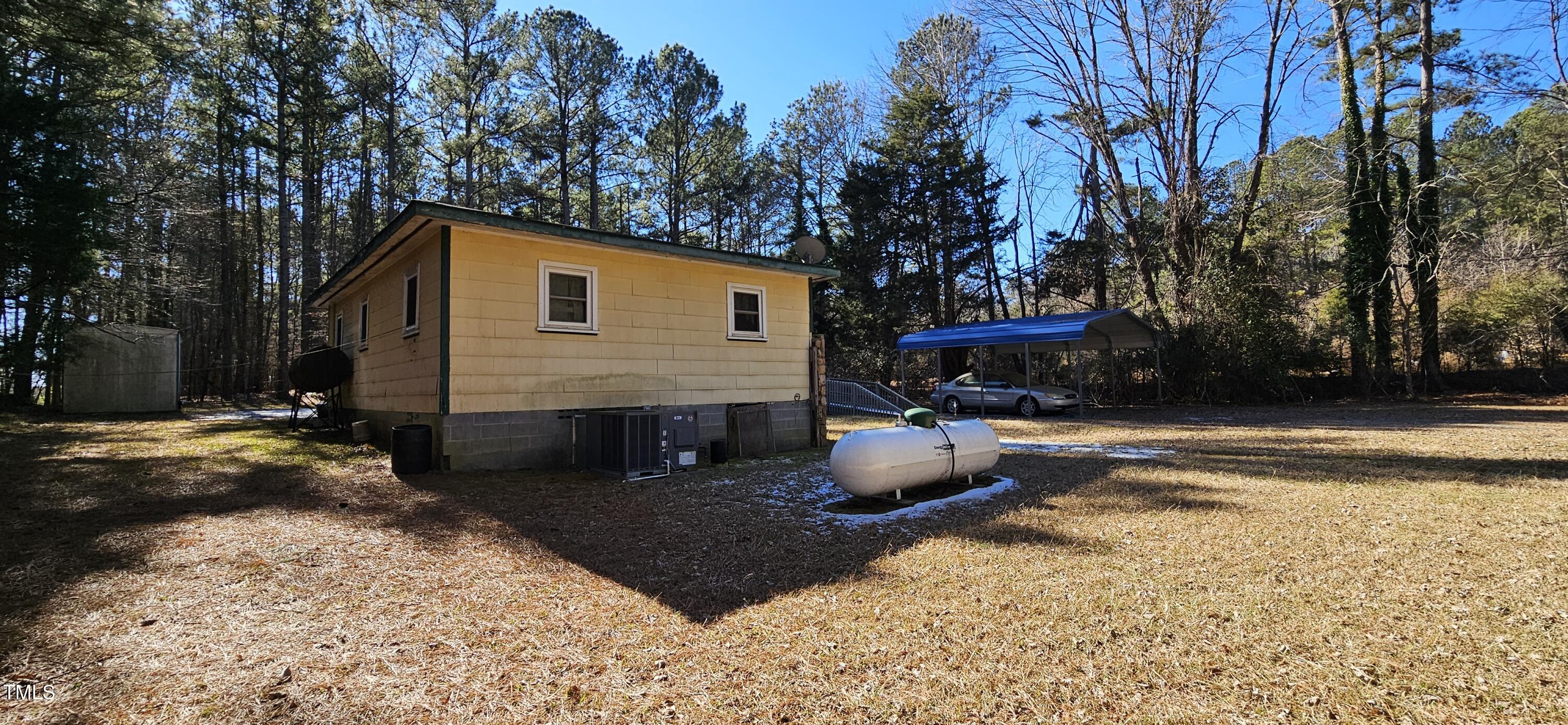 934 Shady Lawn Road Chapel Hill, NC 27514 - Photo 2 of 8 a view of a house with backyard and sitting area