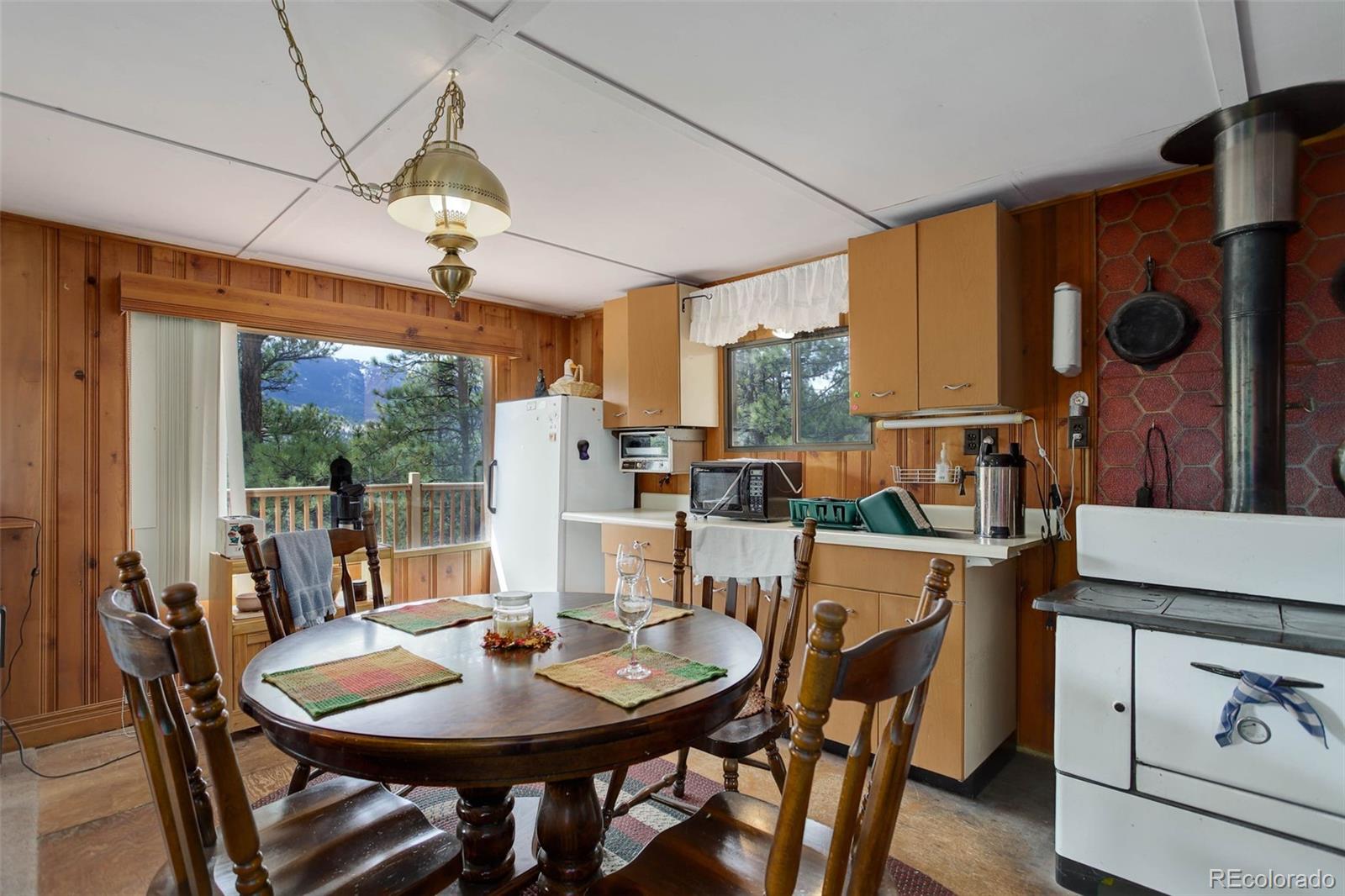 Undisclosed Address Bailey, CO 80421 - Photo 10 of 21 a dining room with furniture and window