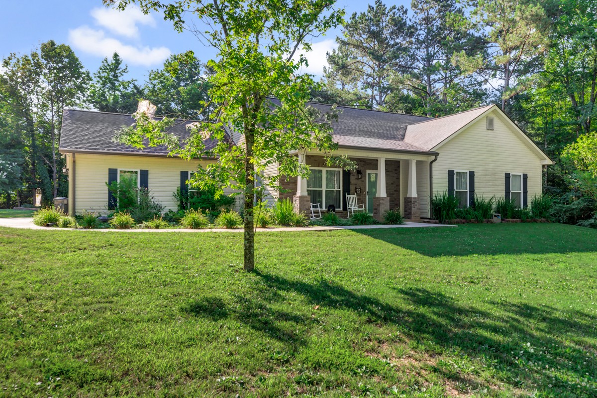 247 Mabel Hill Road Toney, AL 35773 - Photo 2 of 29 a view of house with a backyard