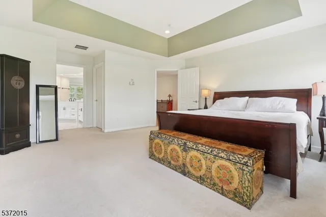 a bedroom with a bed and closet