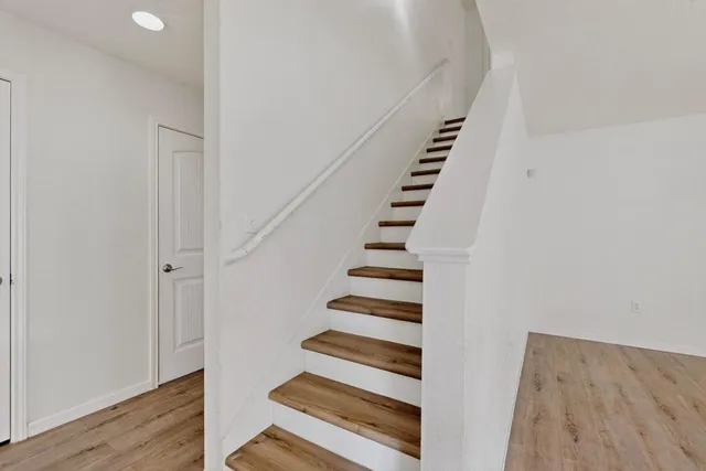 a view of entryway with wooden floor