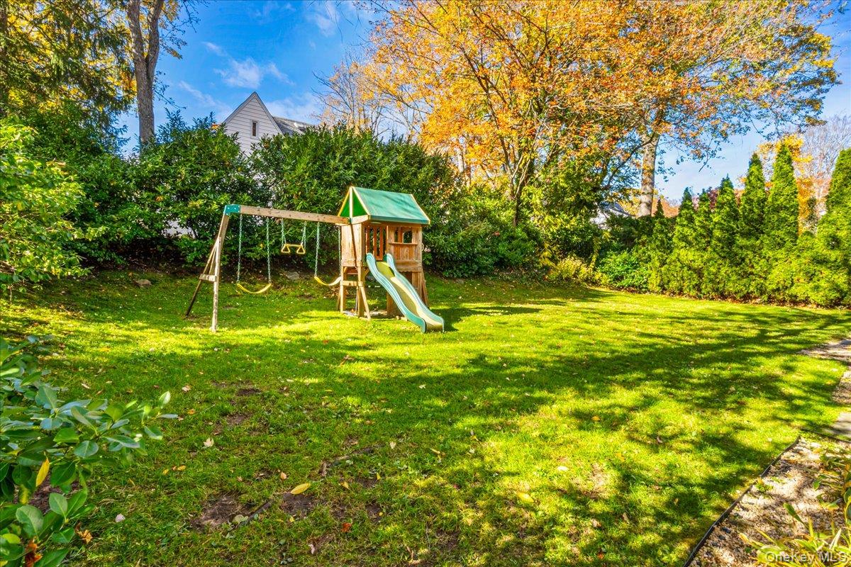 53 Stuart Place Manhasset, NY 11030 - Photo 26 of 32 a view of a slide with a slide