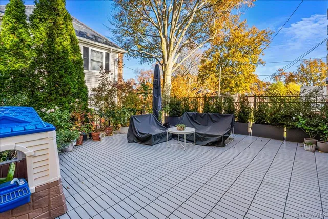 a front view of house with garden