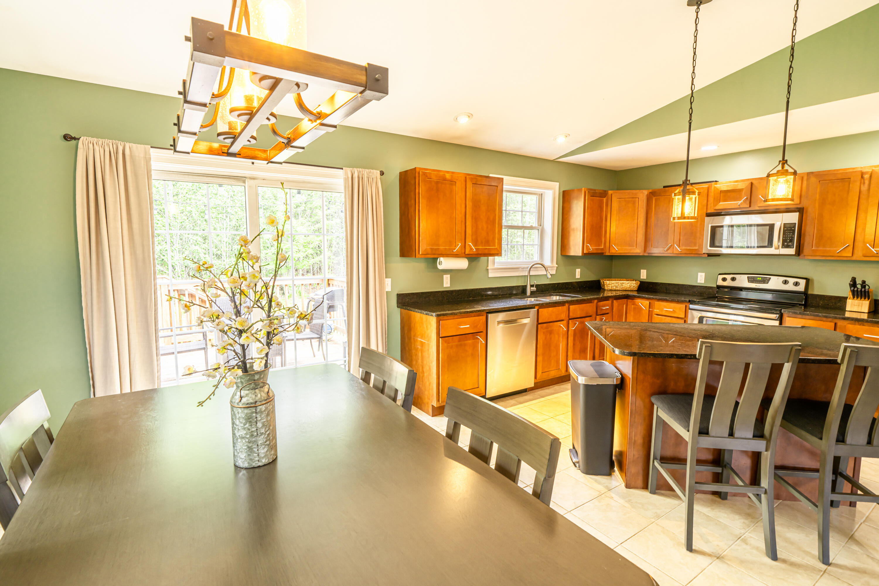 57 Wessnette Drive Hampden, ME 04444 - Photo 11 of 40 Dining area to Kitchen-patio doors and r