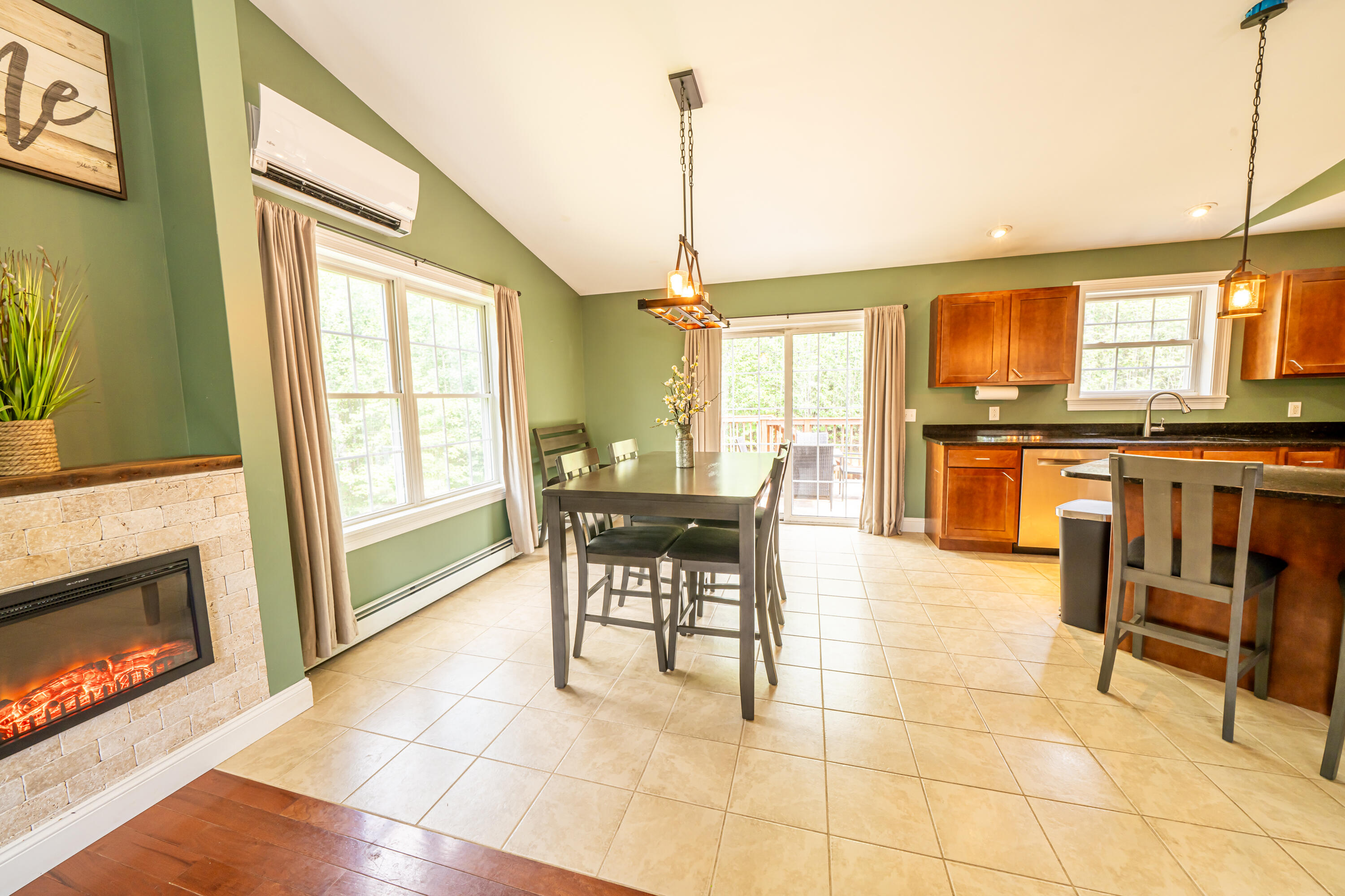 57 Wessnette Drive Hampden, ME 04444 - Photo 20 of 40 Living area to fireplace-dining area-pat