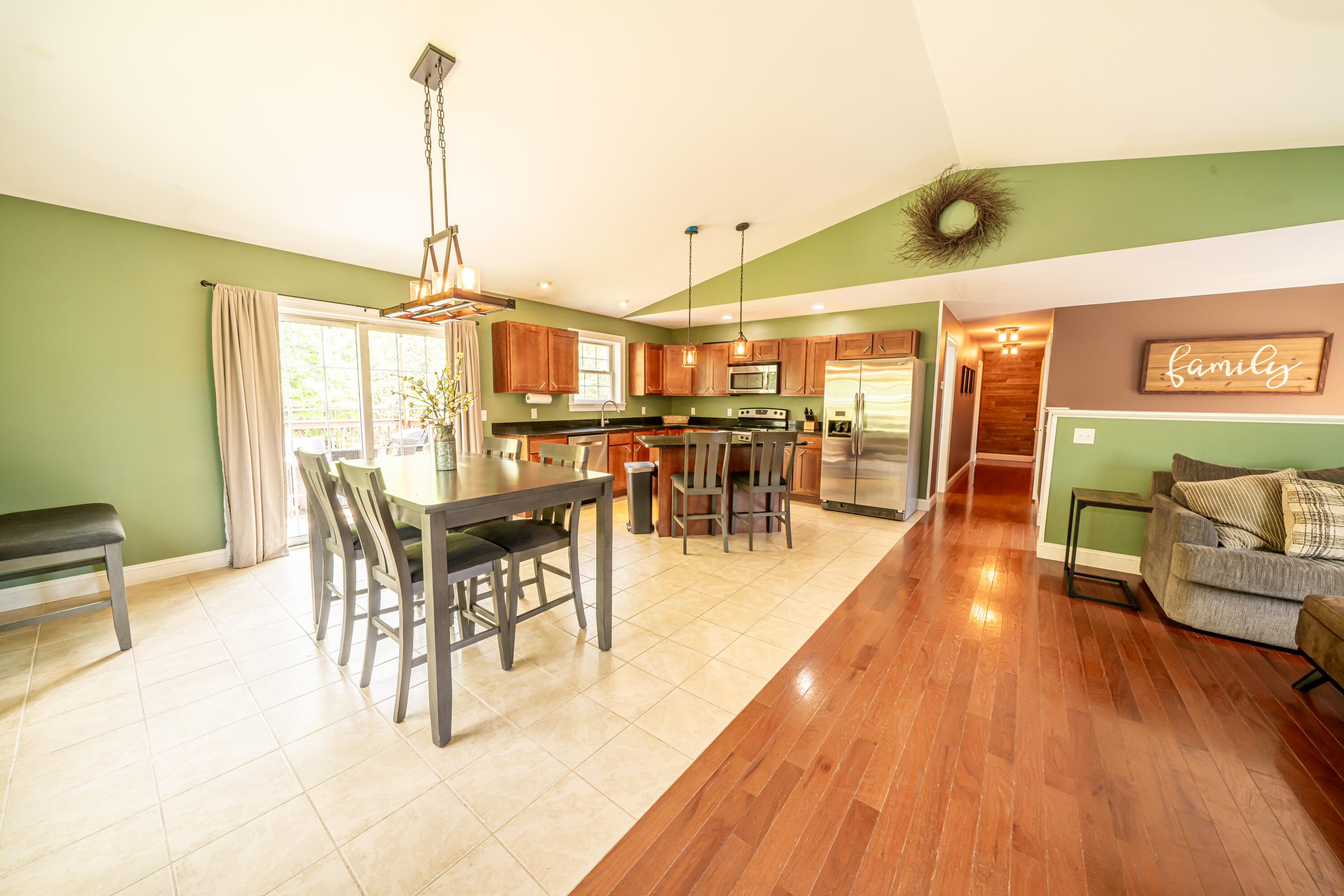 57 Wessnette Drive Hampden, ME 04444 - Photo 21 of 40 Fireplace to dining area-kitchen and mid