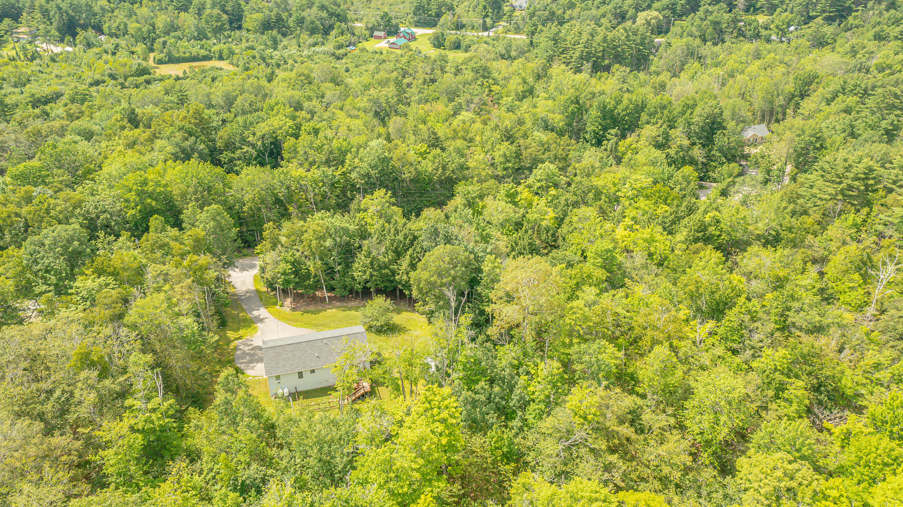 57 Wessnette Drive Hampden, ME 04444 - Photo 7 of 40 Aeial overview shows lush wooded privacy