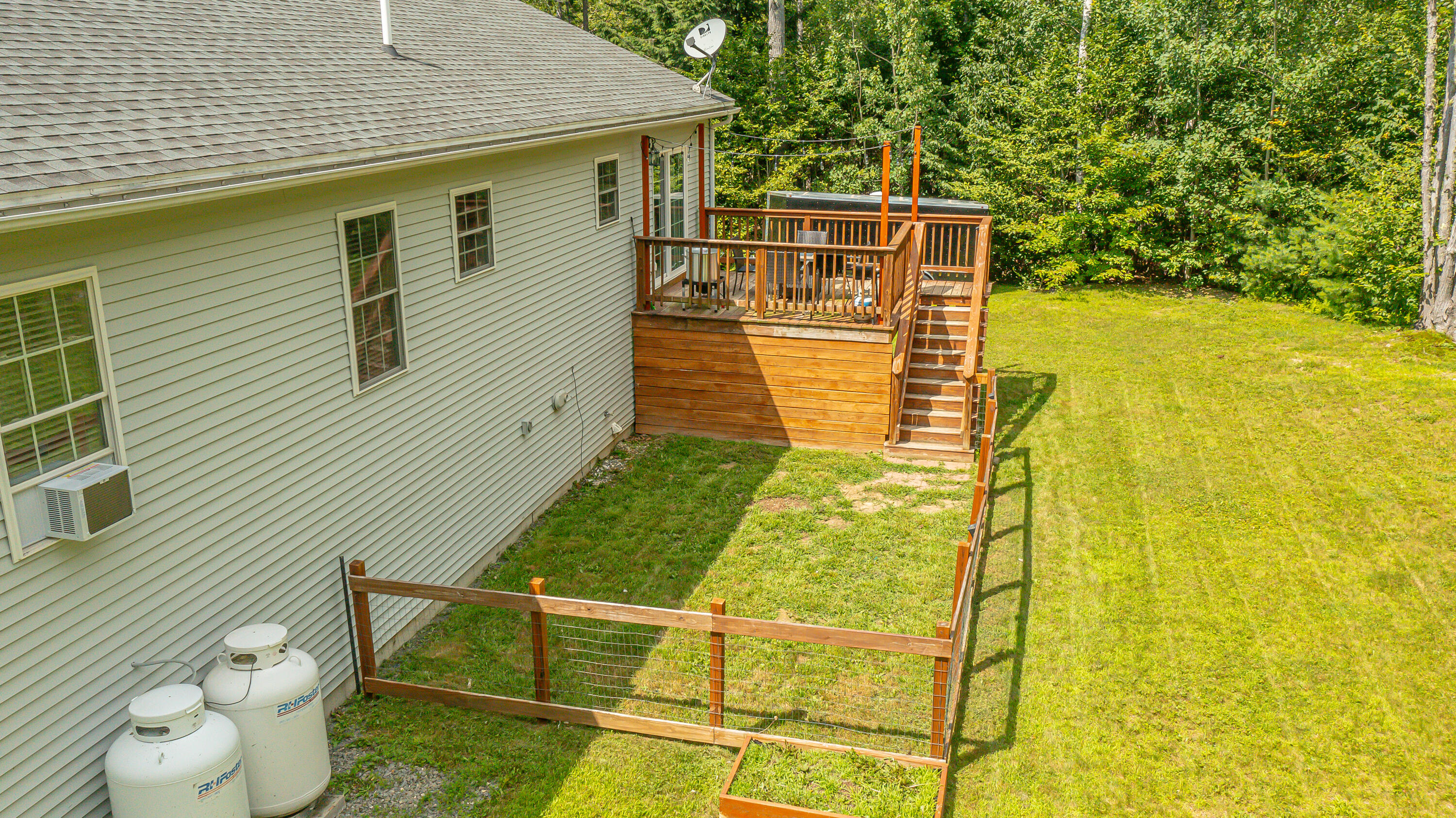 57 Wessnette Drive Hampden, ME 04444 - Photo 8 of 40 Fenced yard for pets off rear deck - Cop