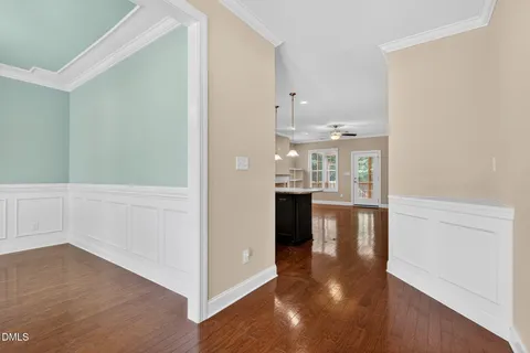 a view of a kitchen with wooden floor