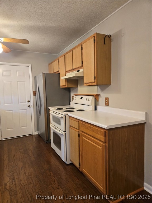 3324 Balero Court Spring Lake, NC 28390 - Photo 11 of 26 a kitchen with stainless steel appliances a stove a sink refrigerator and cabinets