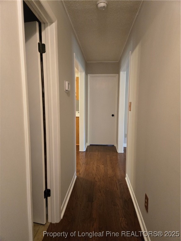 3324 Balero Court Spring Lake, NC 28390 - Photo 17 of 26 a view of a hallway with wooden floor