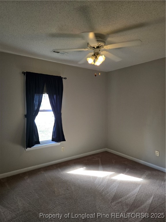 3324 Balero Court Spring Lake, NC 28390 - Photo 18 of 26 a view of wooden floor windows and chandelier fan in an empty room