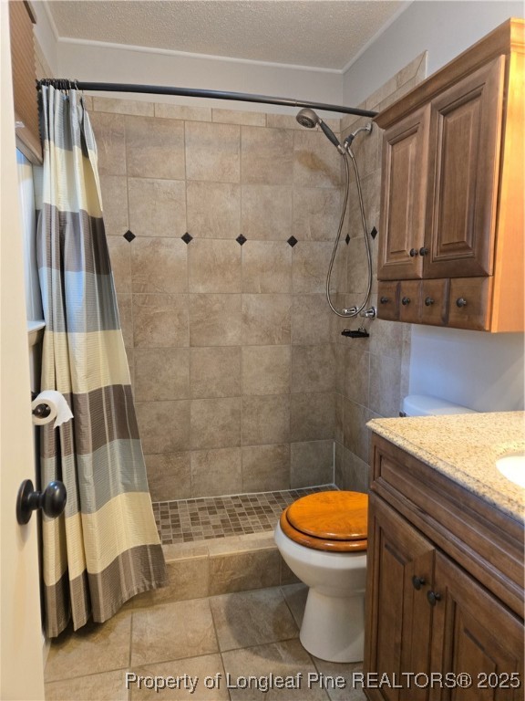 3324 Balero Court Spring Lake, NC 28390 - Photo 20 of 26 a bathroom with a toilet and a shower
