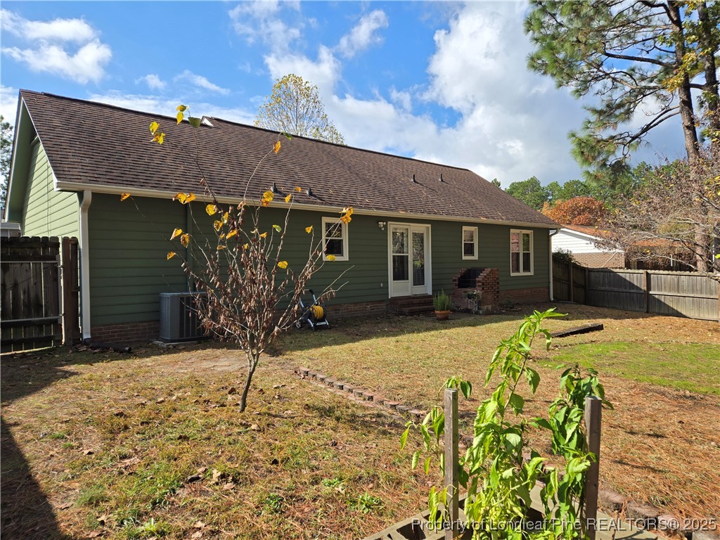 3324 Balero Court Spring Lake, NC 28390 - Photo 7 of 26 a view of a house with a yard