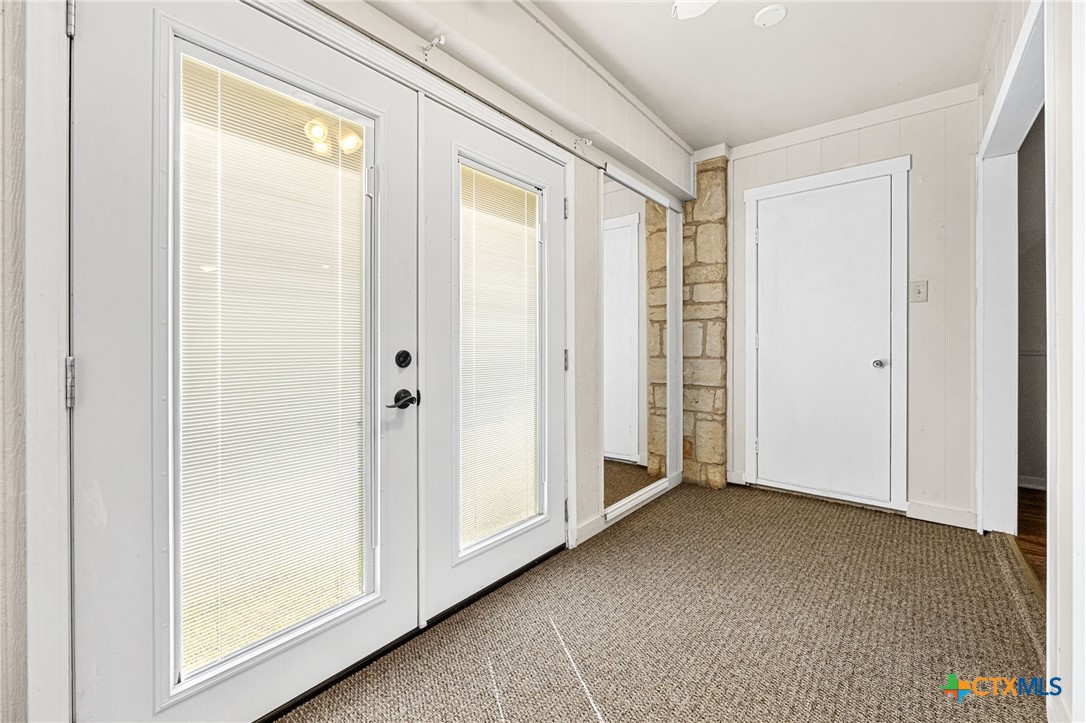 1015 Old Mill Road, Unit 4D Salado, TX 76571 - Photo 11 of 22 a view of an empty room and window