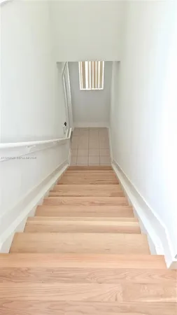 a view of entryway with stairs