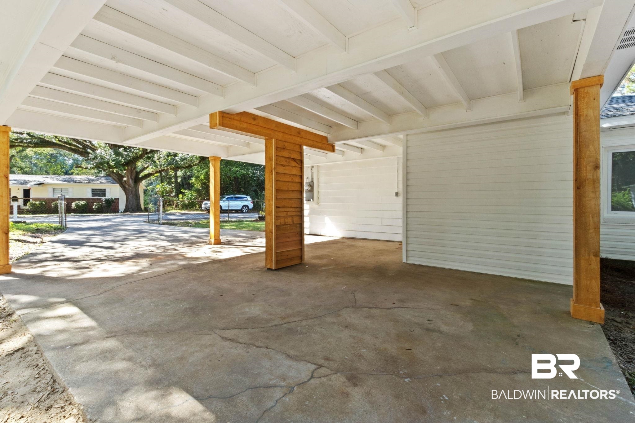 618 Pine Street Saraland, AL 36571 - Photo 31 of 41 Garage featuring a carport
