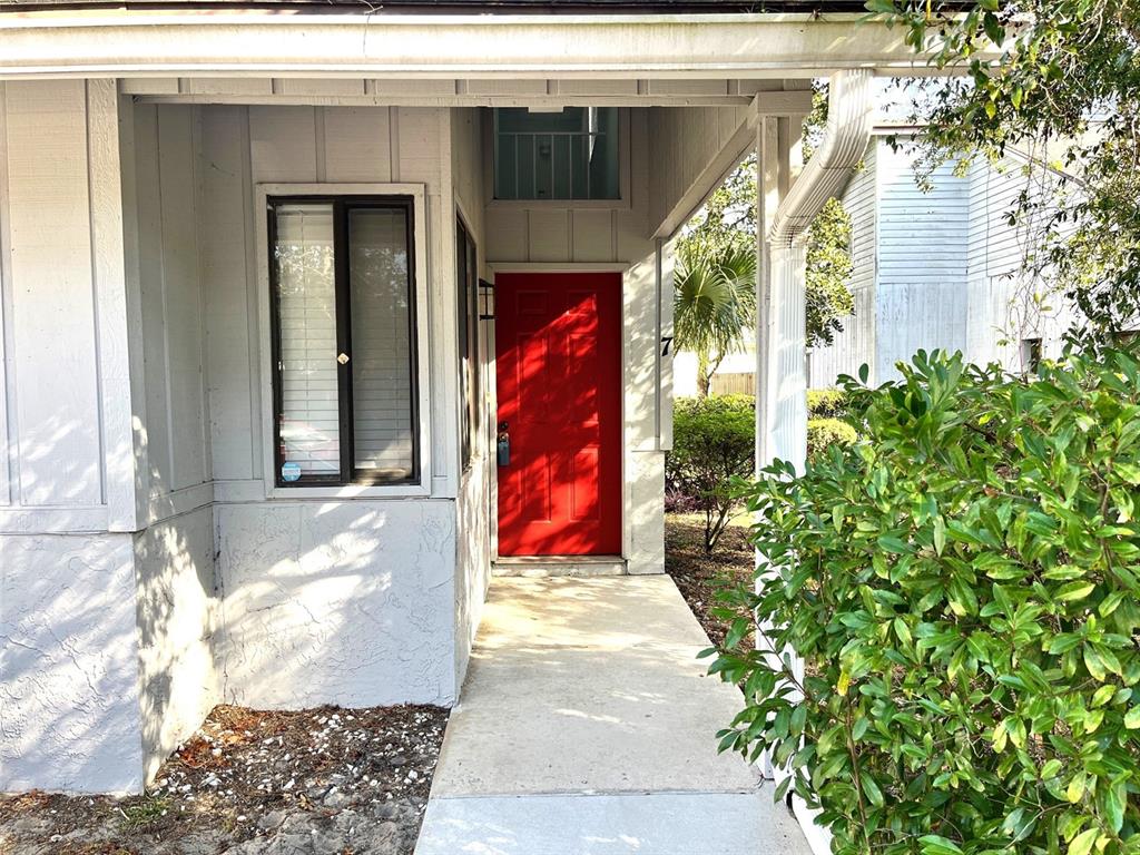 101 North Hill Avenue, Unit 7 Deland, FL 32724 - Photo 1 of 11 a view of a door and a window