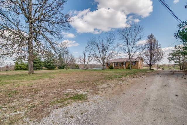 1110 Pond Switch Road Dickson, TN 37055 - Photo 3 of 20 Nice long Drive with beautiful mature trees