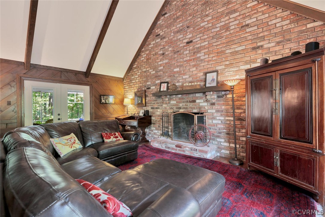15900 Beach Road Chesterfield, VA 23838 - Photo 13 of 45 a living room with furniture and a fireplace