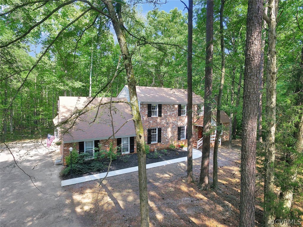 15900 Beach Road Chesterfield, VA 23838 - Photo 3 of 45 a view of house with a yard and hanging chair