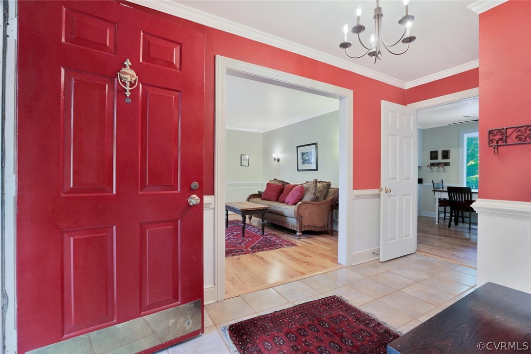 15900 Beach Road Chesterfield, VA 23838 - Photo 5 of 45 a bed room with a bed mirror and a chair