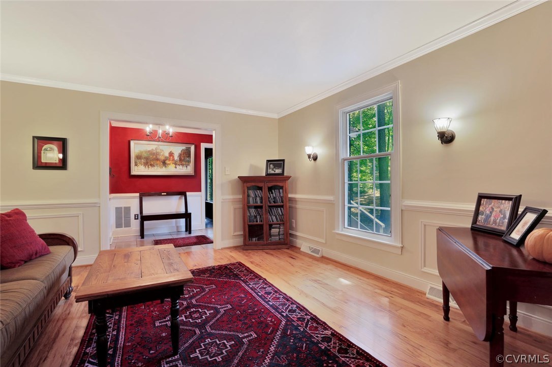 15900 Beach Road Chesterfield, VA 23838 - Photo 8 of 45 a living room with furniture and a wooden floor