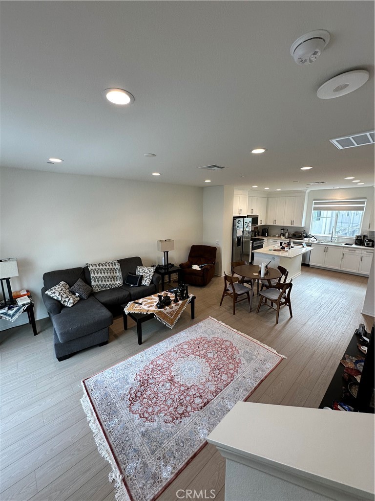 5864 Linden Avenue, Unit 3 Long Beach, CA 90805 - Photo 15 of 54 Open kitchen to living / dining combo.